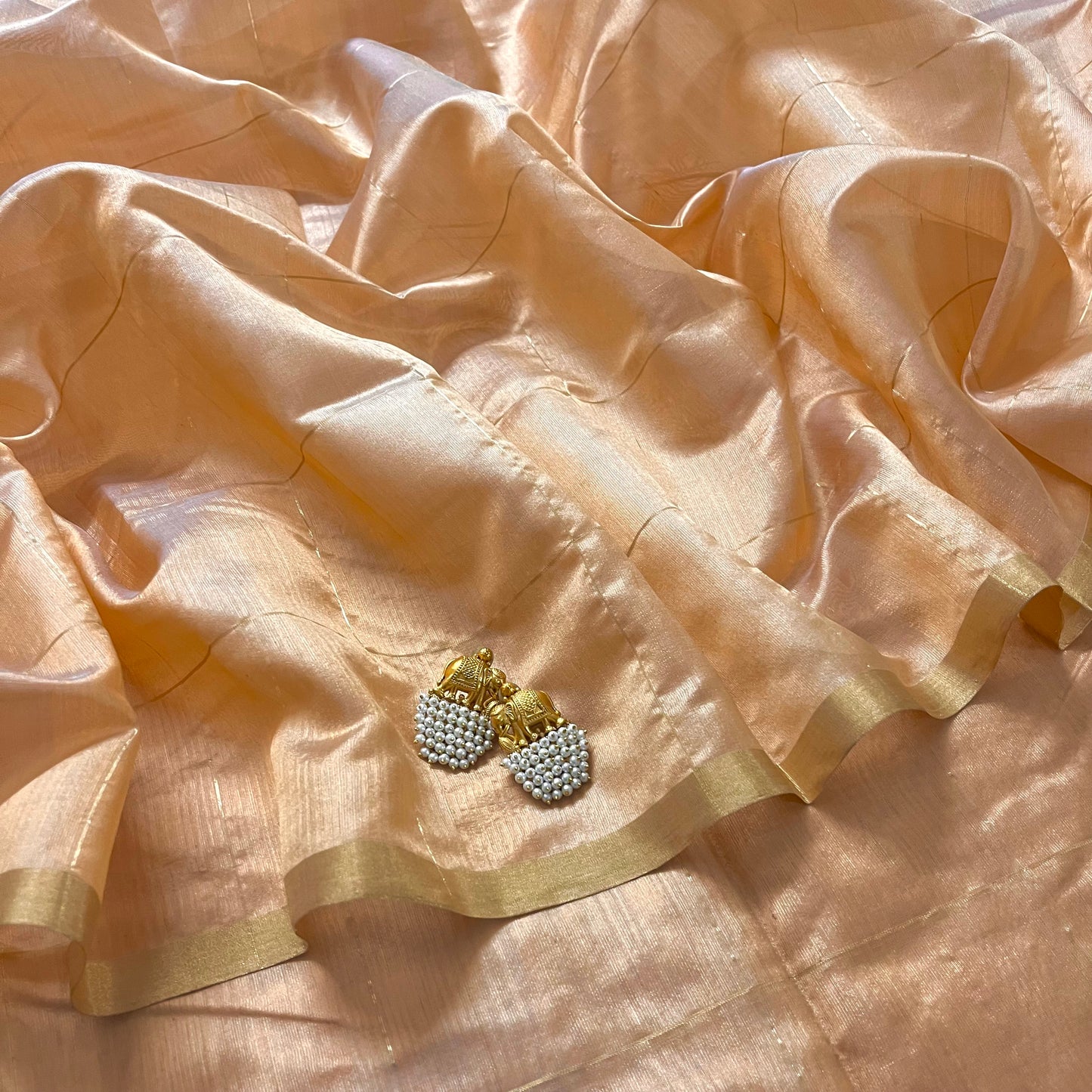 Sand beige Chanderi silk saree with zari checks all over