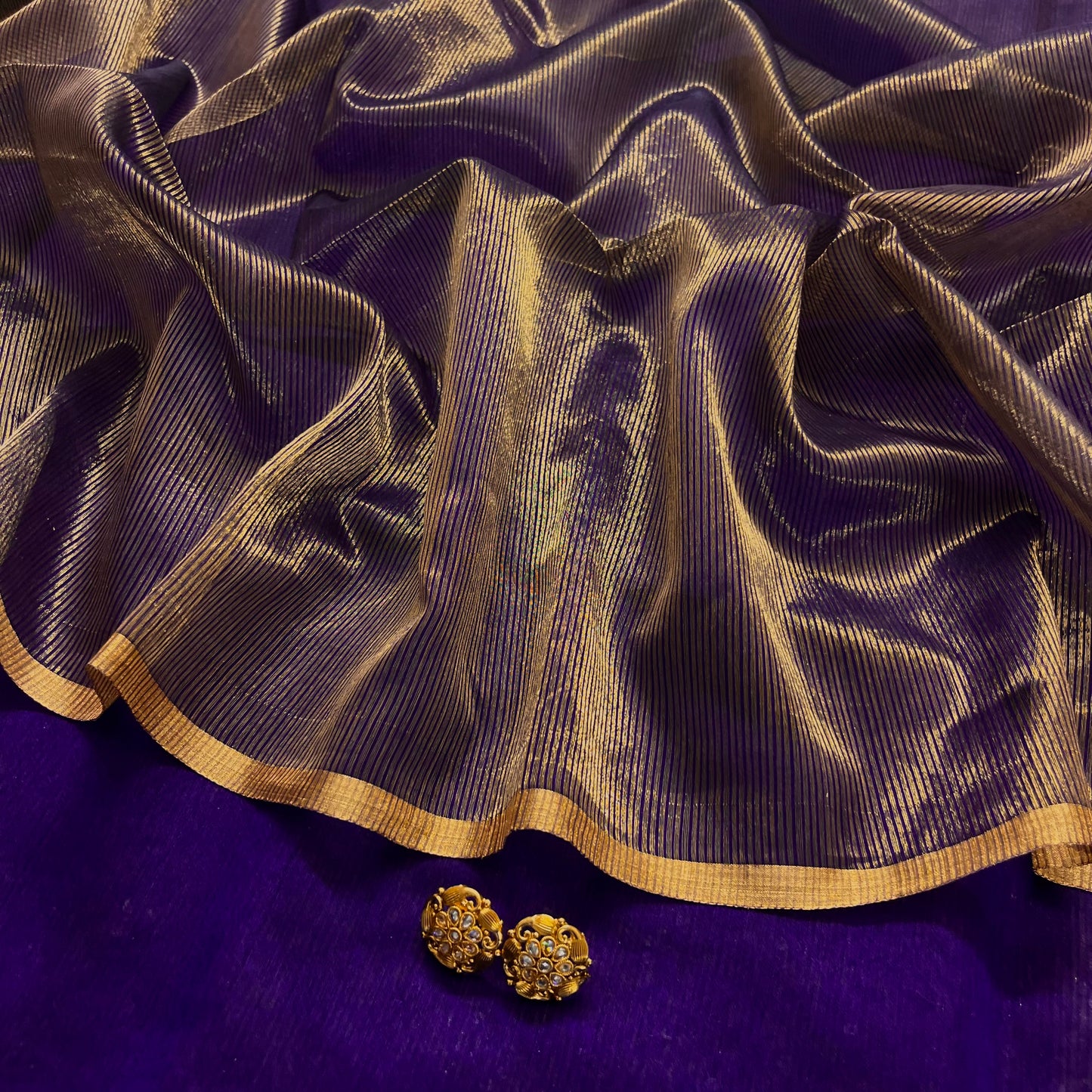 Dark purple and gold maheshwari saree with zari border