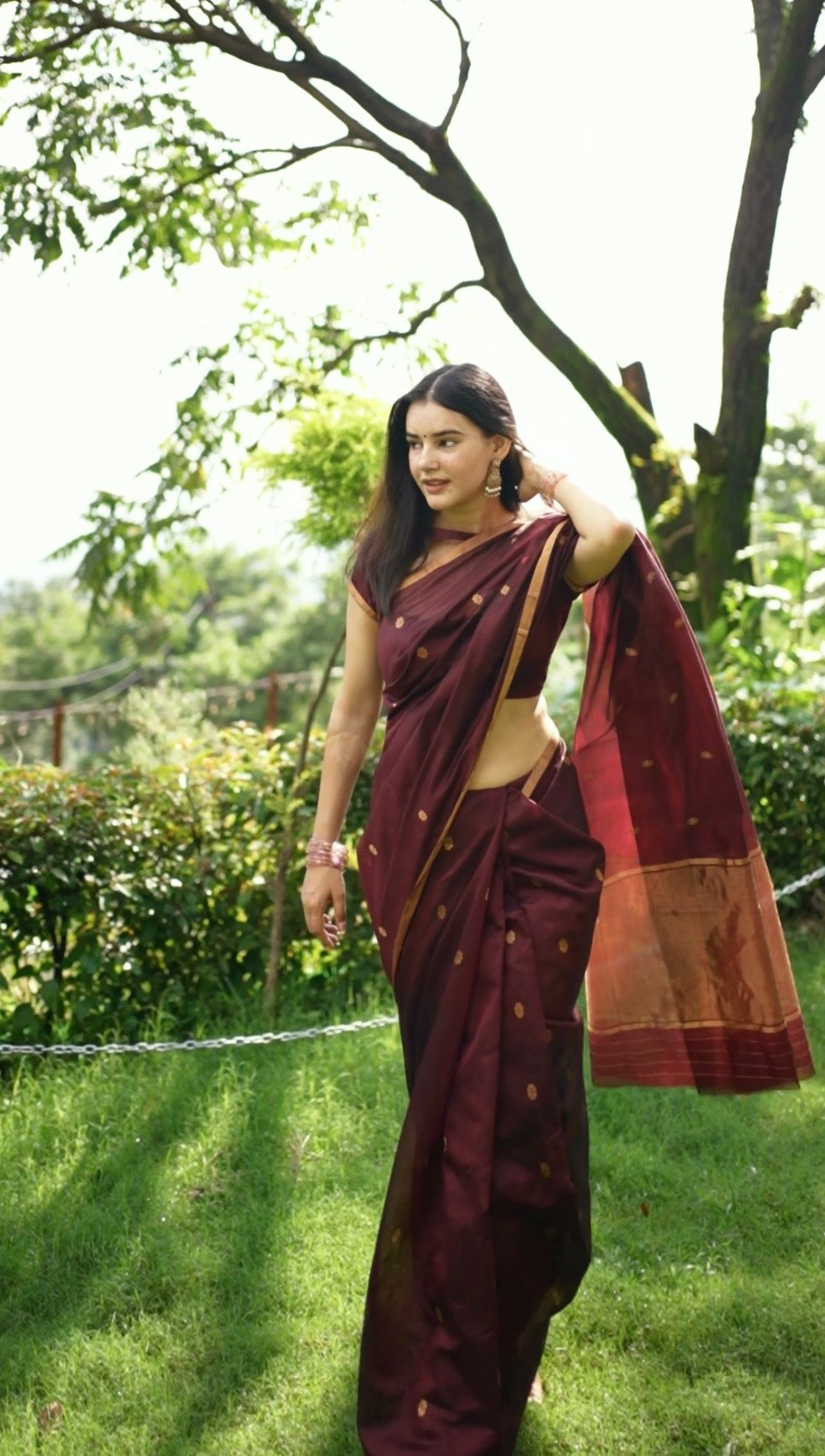 Mahogany Chanderi silk saree with flower bootis all over