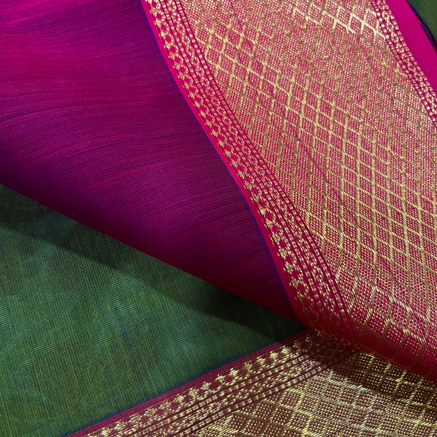 Green and pink dual tone Maheshwari saree with zari motifs all over