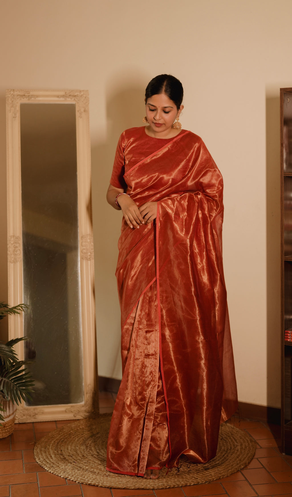 Red Maheshwari saree with zari lines all over