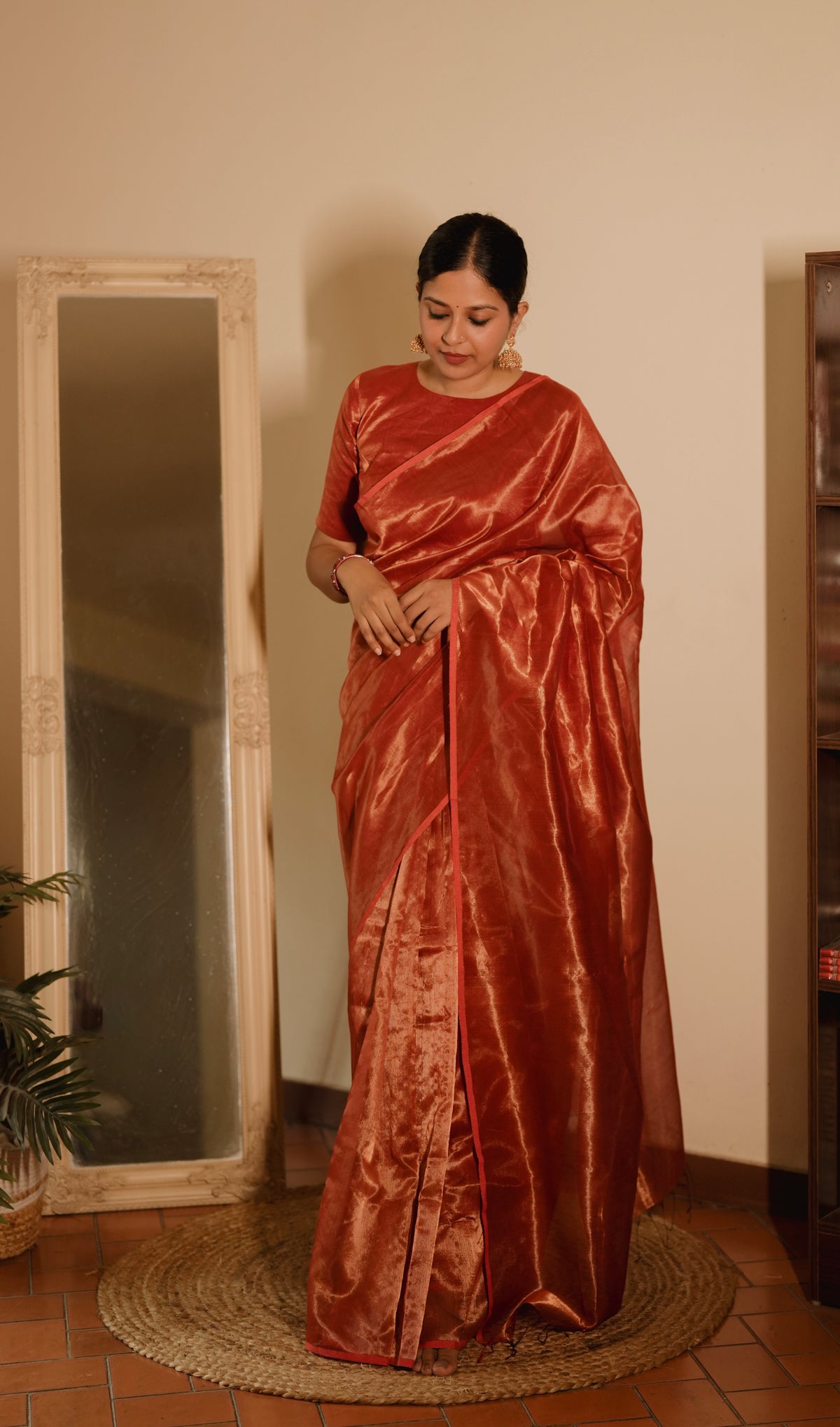 Red Maheshwari saree with zari lines all over