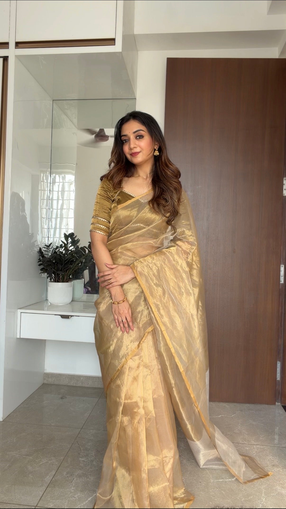 Gold Chanderi tissue silk saree with zari lines on pallu