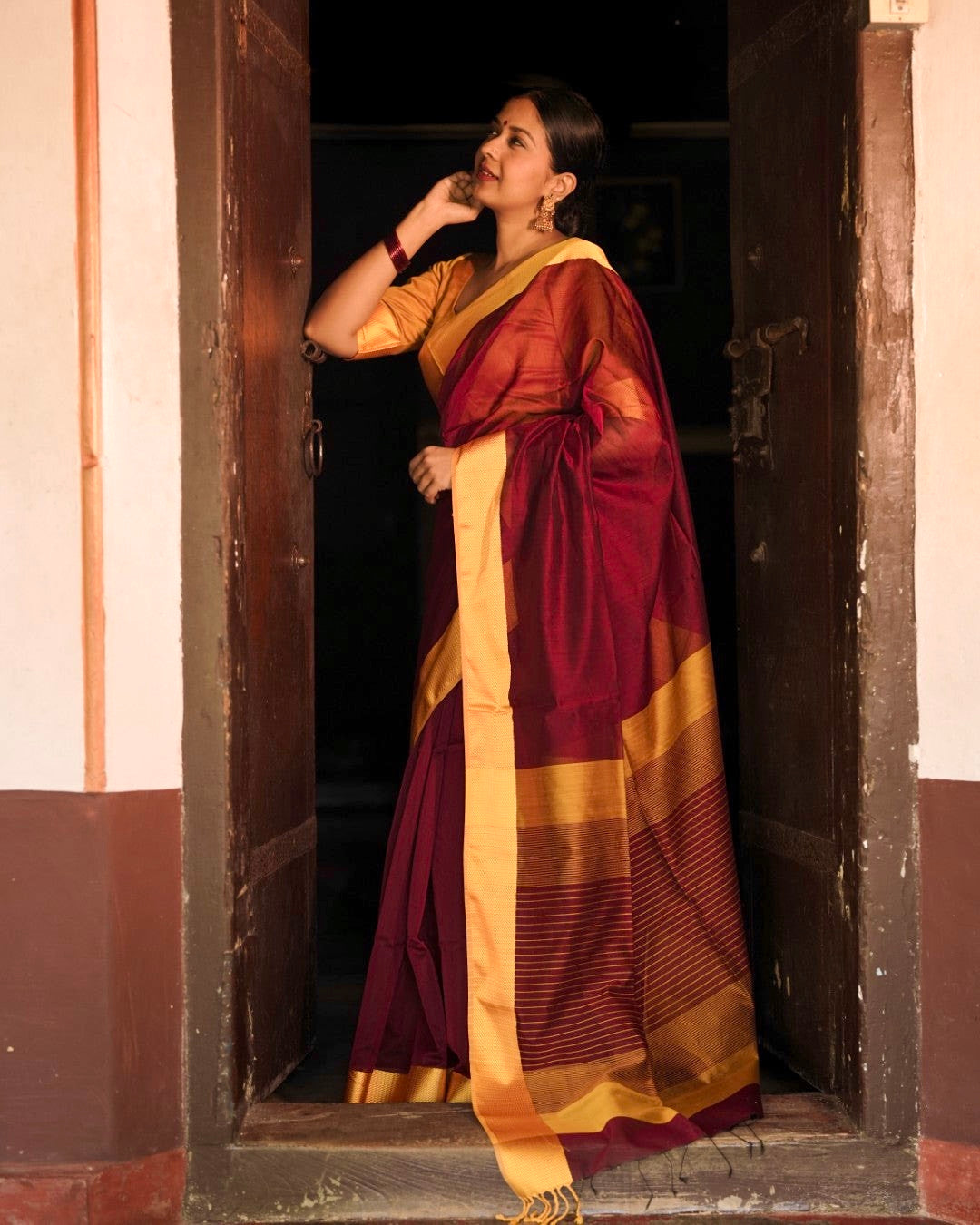 Maroon and yellow maheshwari with resham border