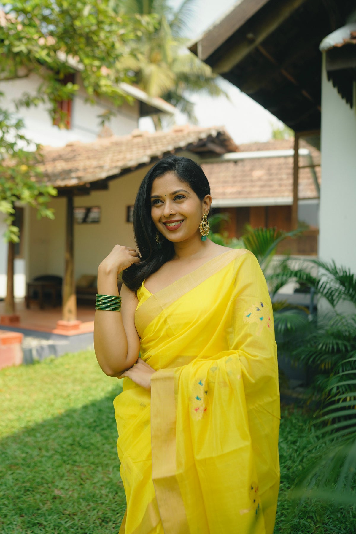 Yellow Chanderi saree with birds on tree motifs all over