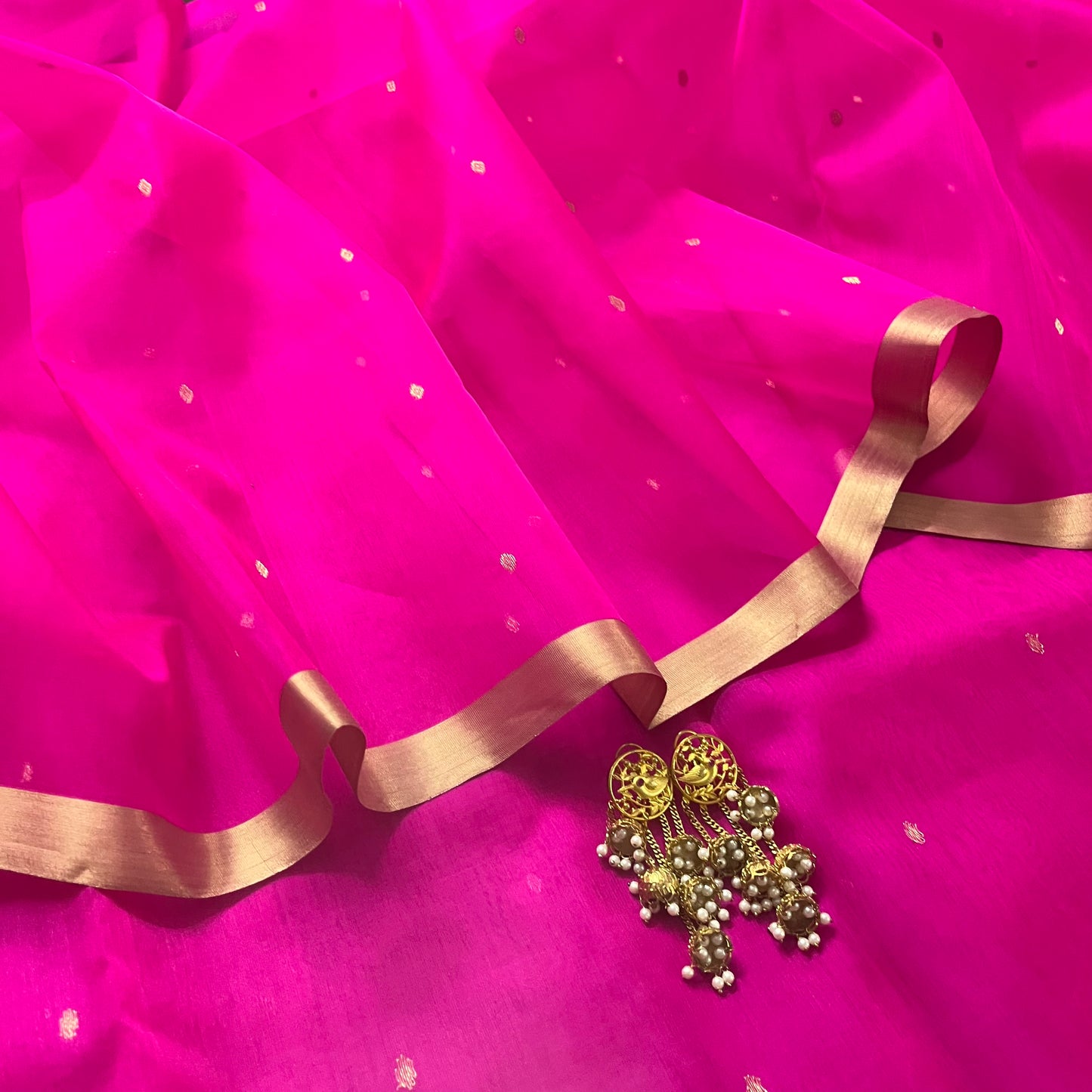 Fuschia pink Chanderi silk saree with zari bootis all over
