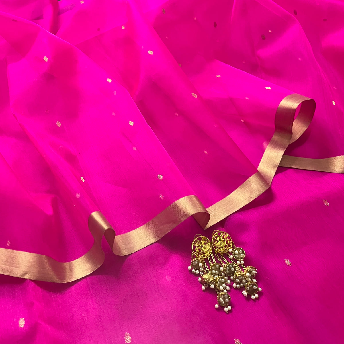 Fuschia pink Chanderi silk saree with zari bootis all over
