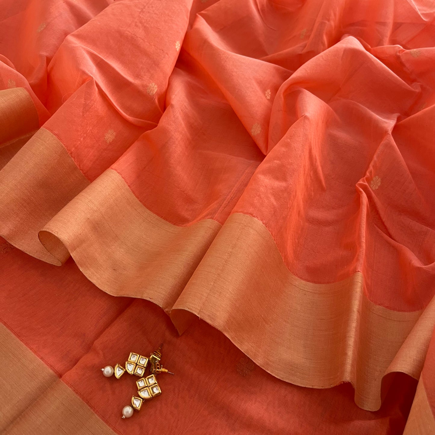 Peachish pink Chanderi saree with zari pattern on pallu