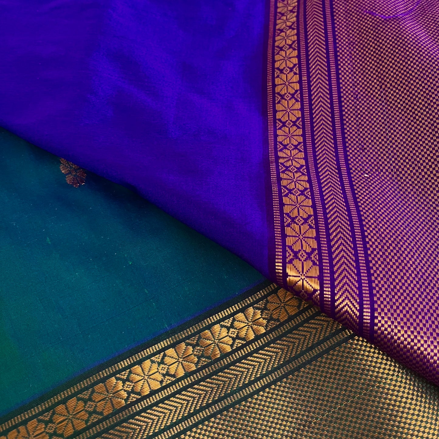 Peacock blue dual tone Maheshwari silk saree with flower bootis all over