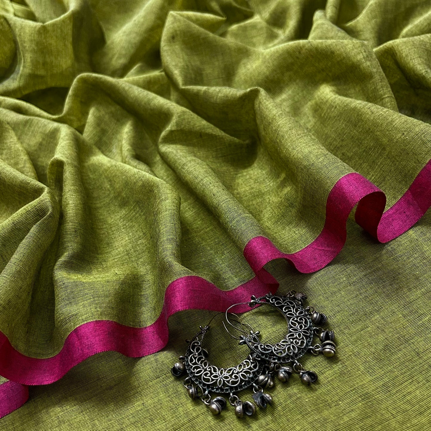 Olive green and pink mulmul saree