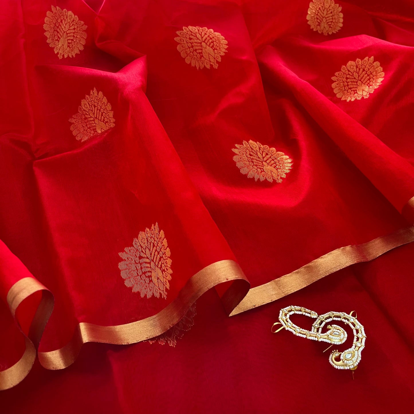 Red Chanderi silk saree with mor motifs all over