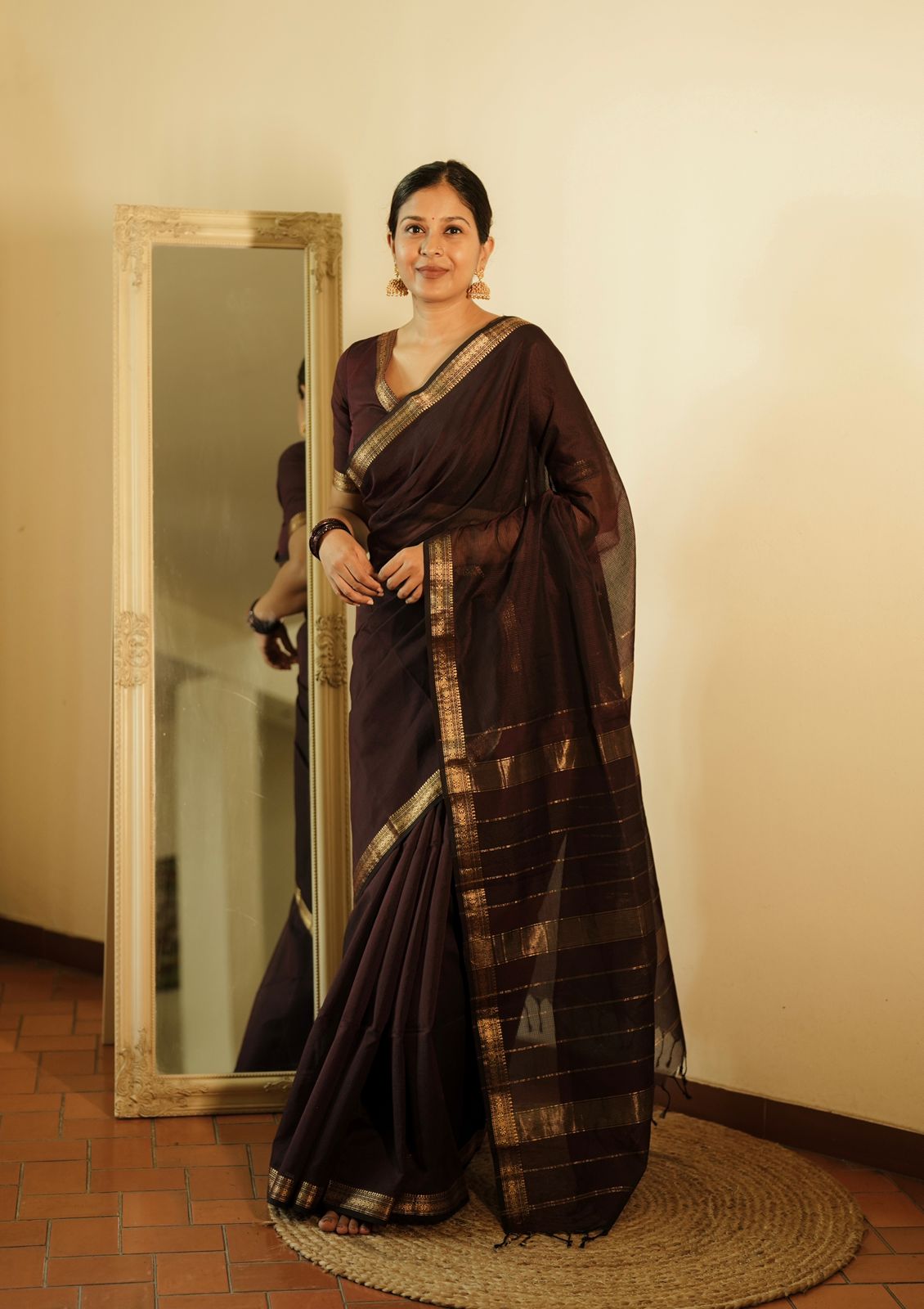 Mahoganay Maheshwari saree with zari border and zari lines on pallu