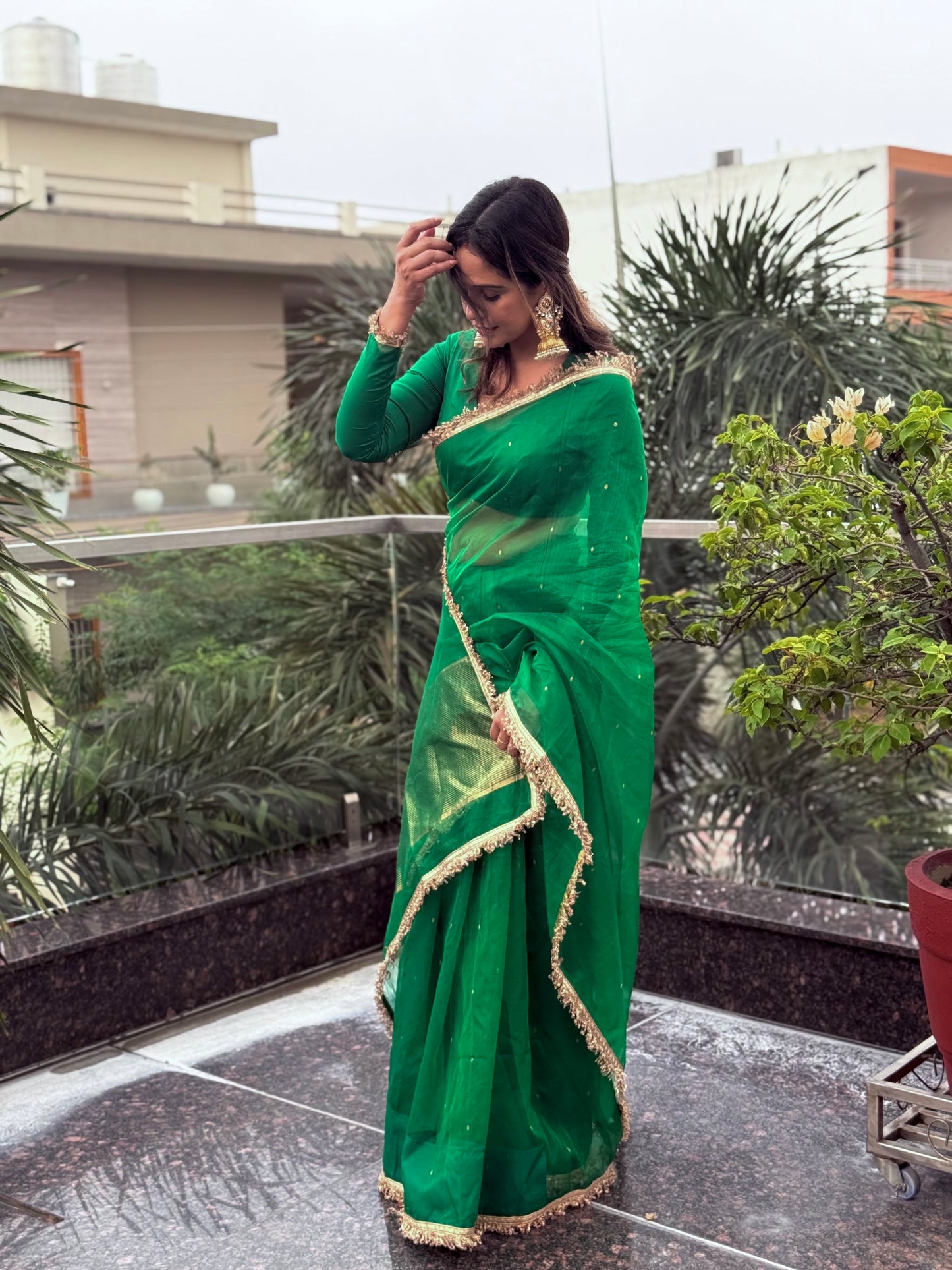 Emerald Green Chanderi silk saree with zari bootis all over