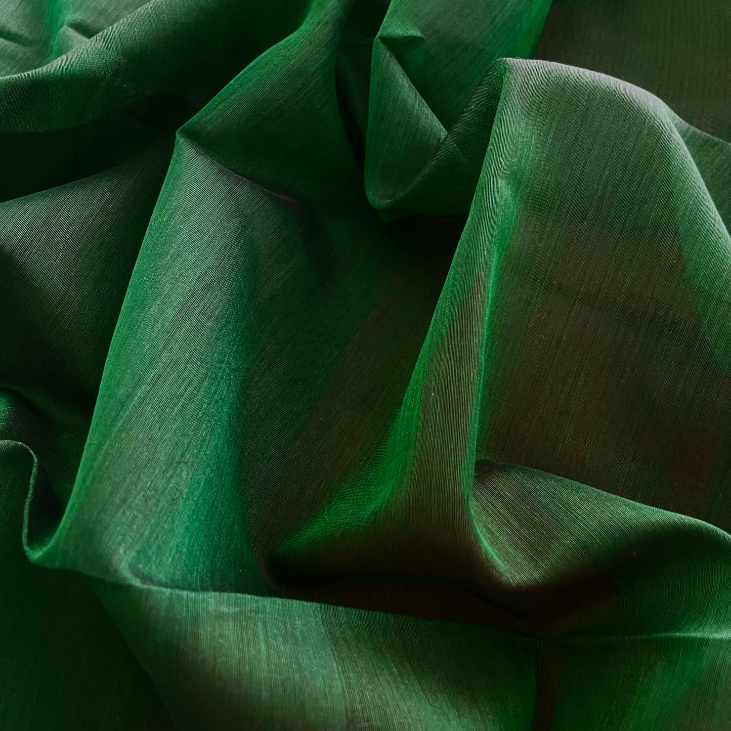 Green and pink Maheshwari saree with zari border