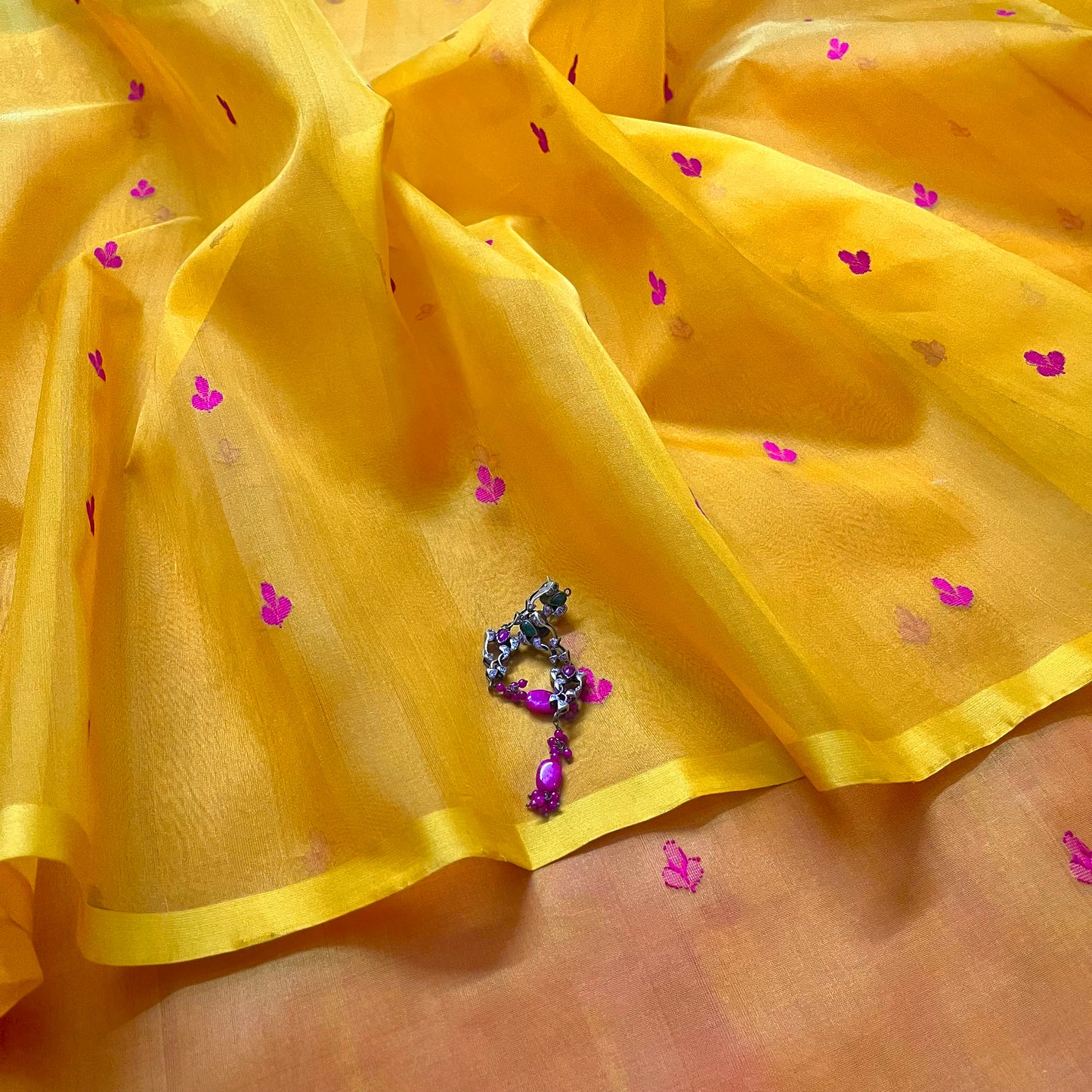Mustard and pink Chanderi silk saree with resham bootis all over