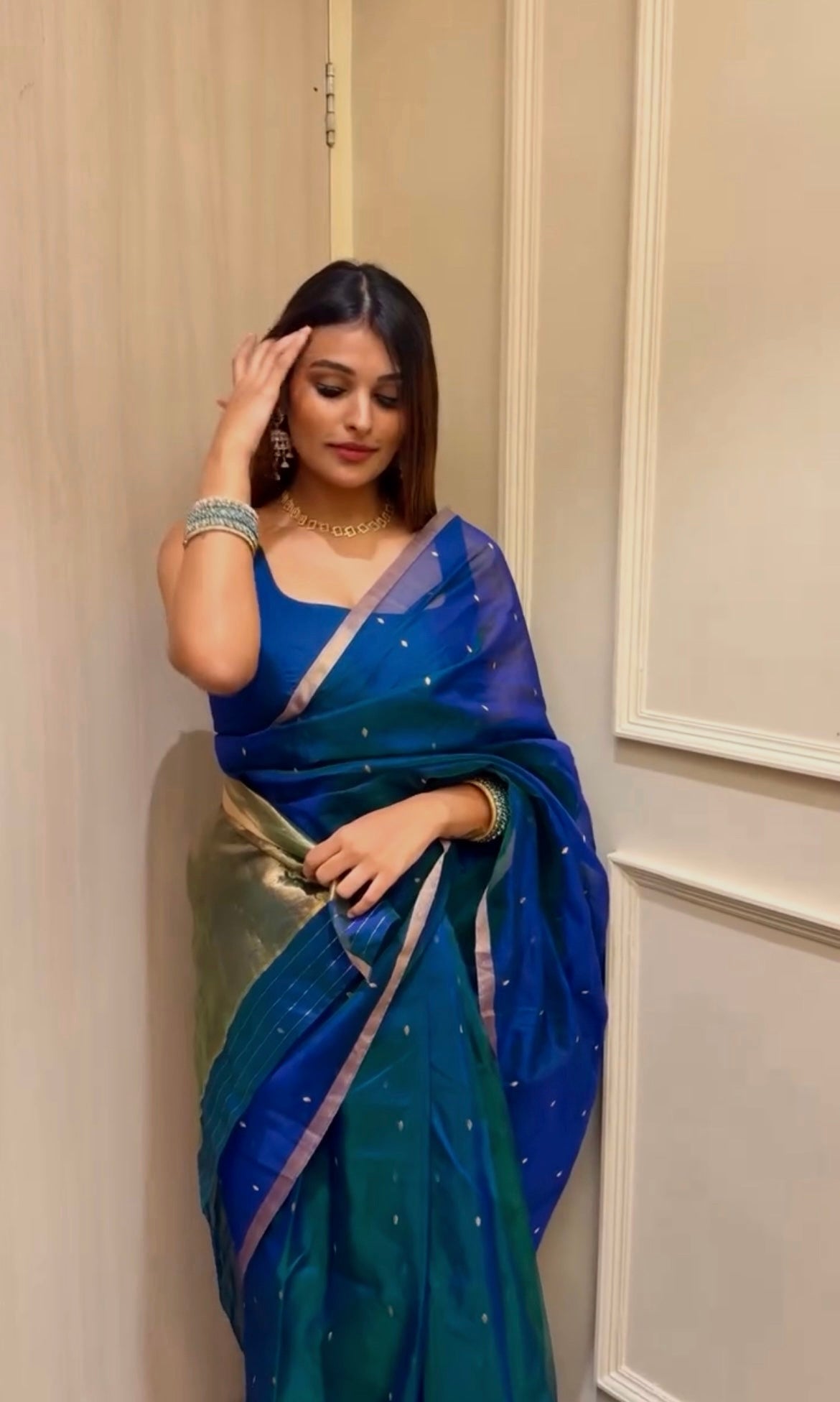 Peacock blue and green dual tone Chanderi organza silk saree with zari bootis all over
