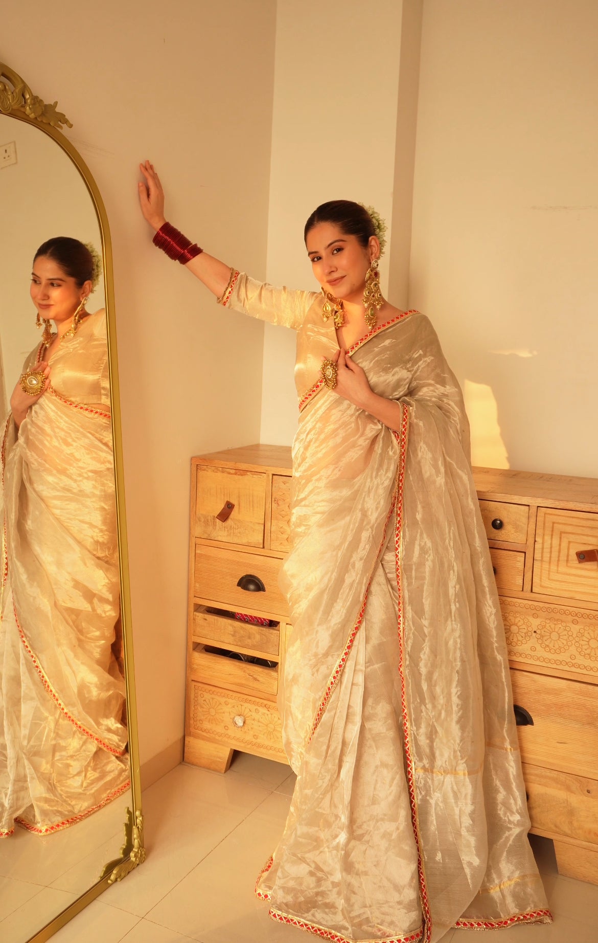 Chantilly cream and red Chanderi tissue silk saree with zari bootis all over