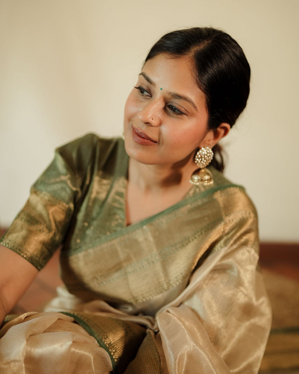 Cream Gold and green Maheshwari tissue silk saree with zari pattern on pallu