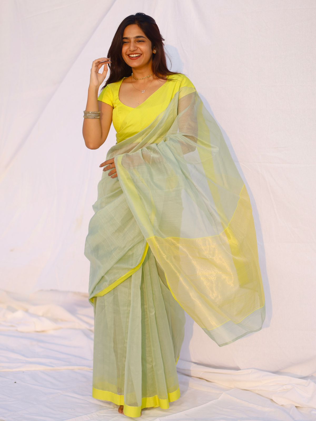 Sage and lemon Chanderi saree with zari lines on pallu