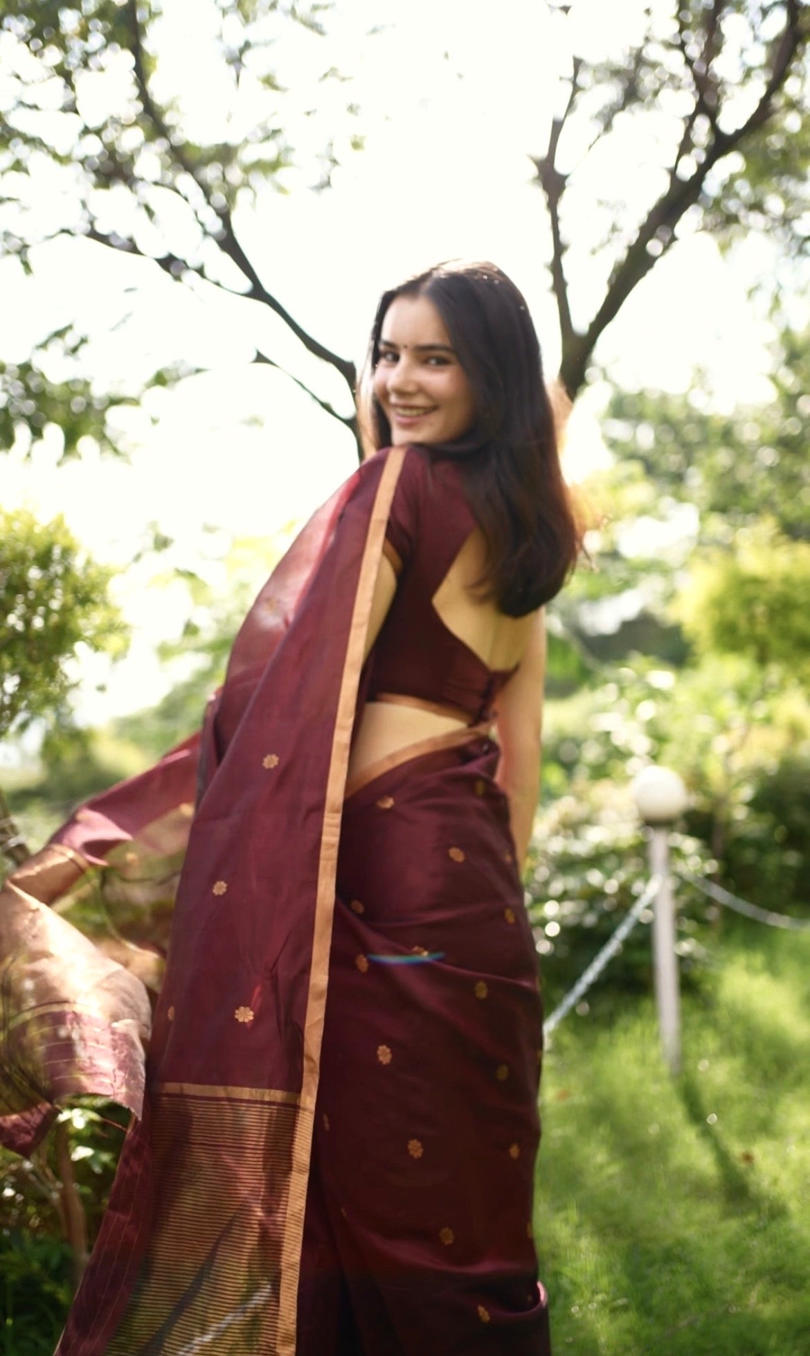 Mahogany Chanderi silk saree with flower bootis all over
