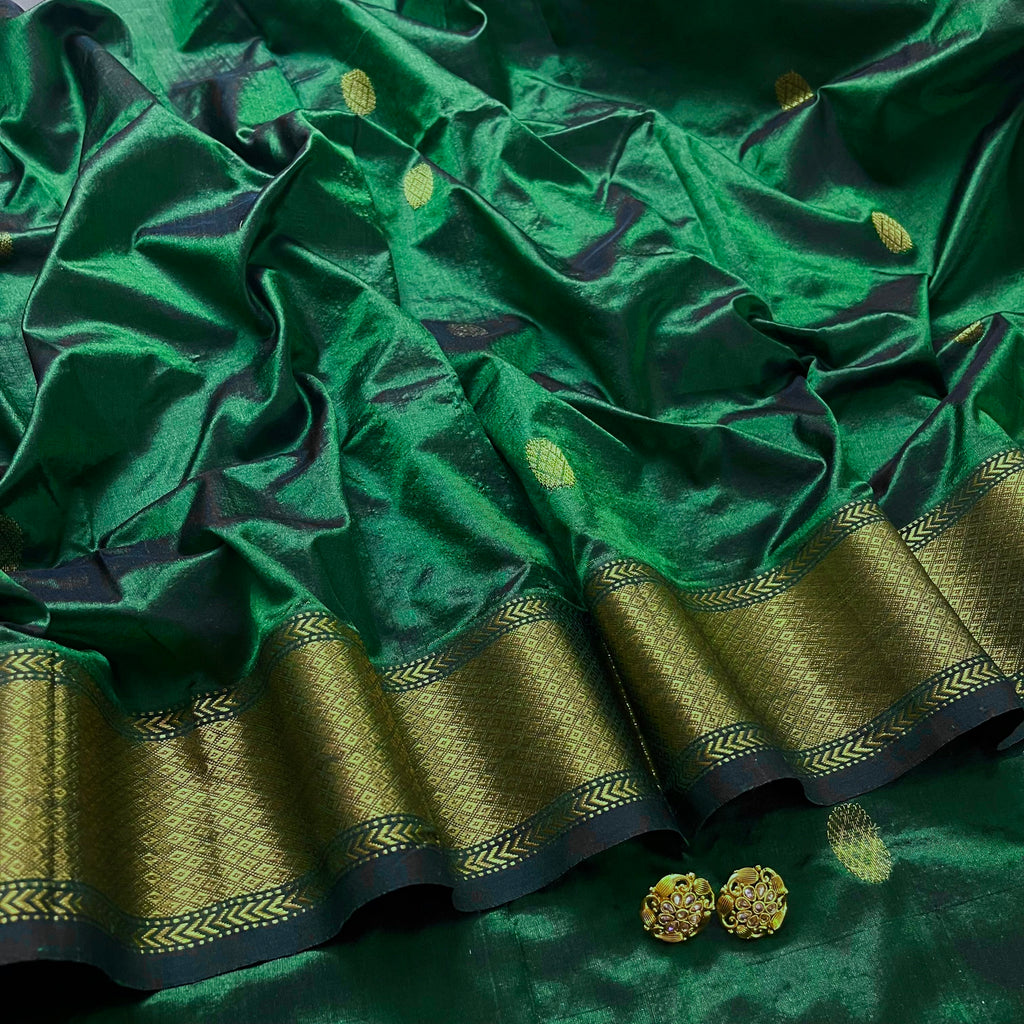 Dark green maheshwari silk saree with zari bootis all over
