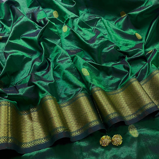 Dark green maheshwari silk saree with zari bootis all over