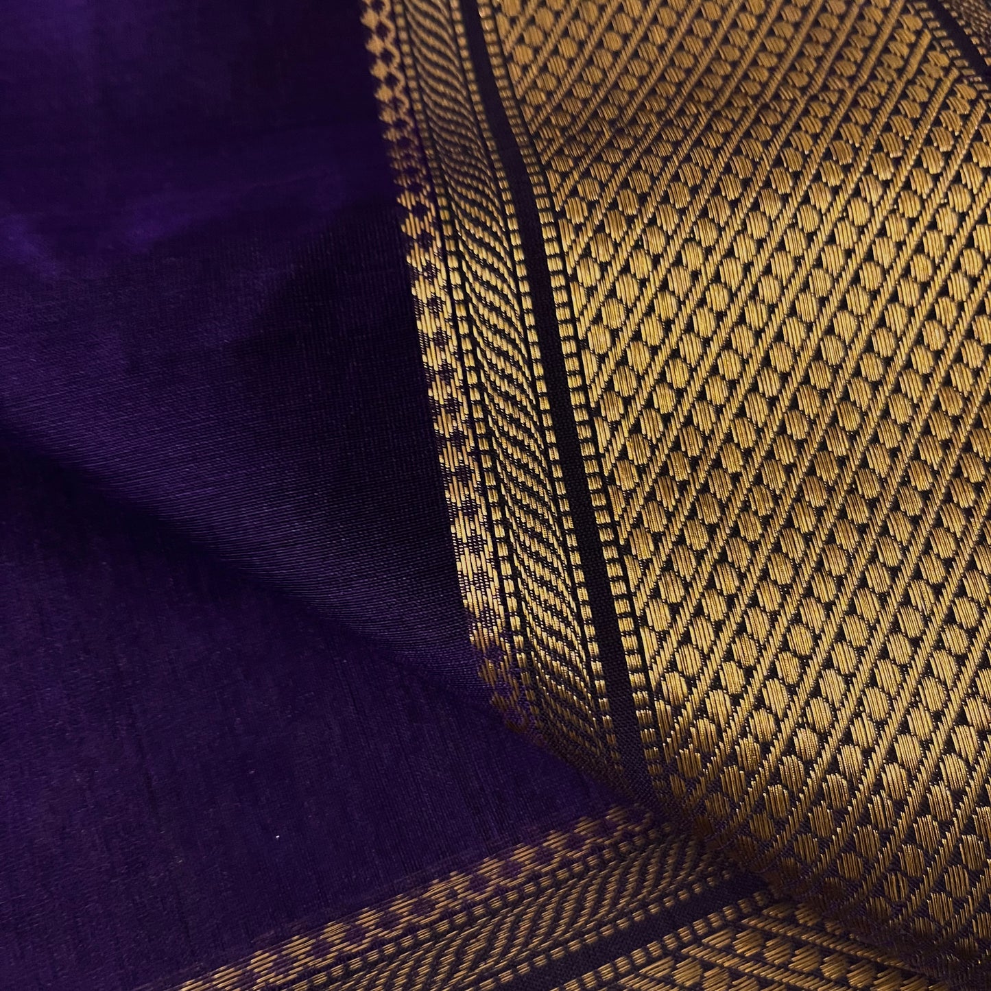 Dark purple Maheshwari saree with zari motifs all over