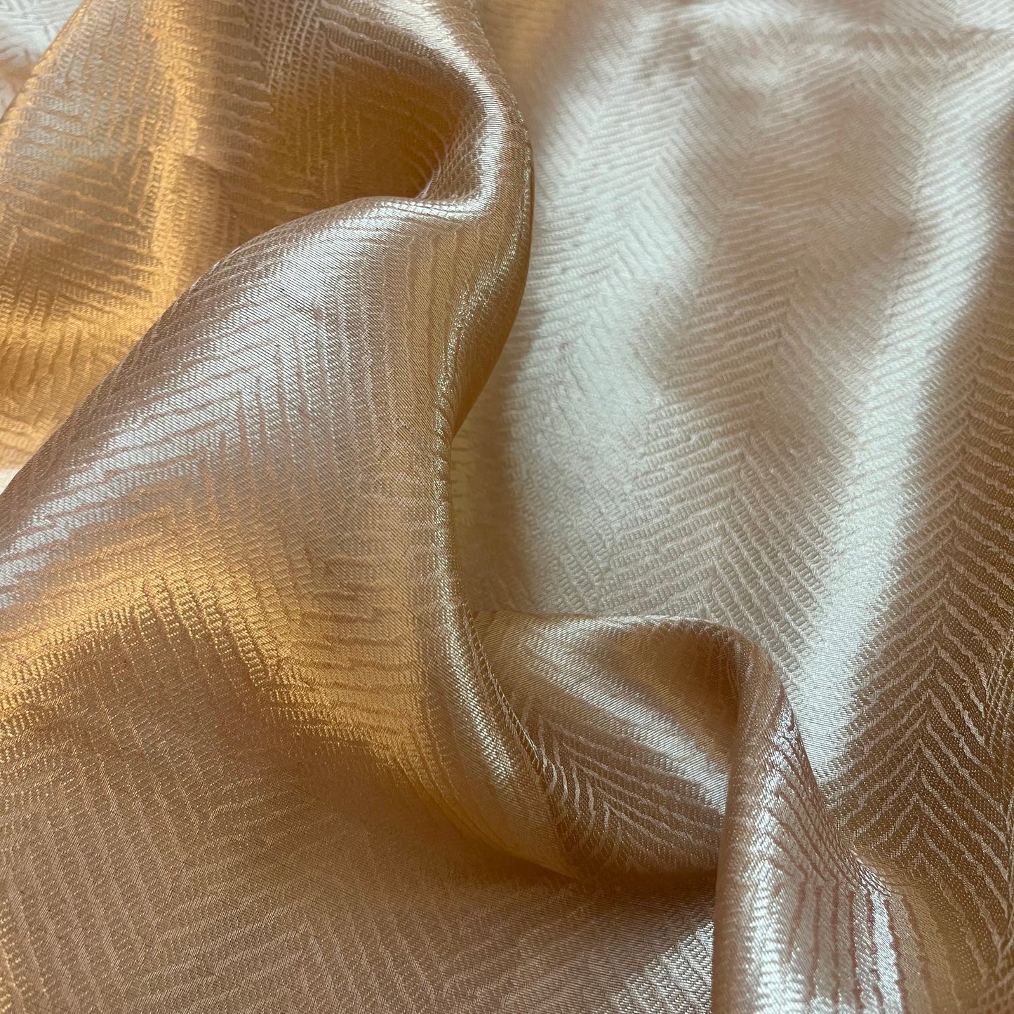 Champagne gold Banarasi silk saree with zari pattern all over