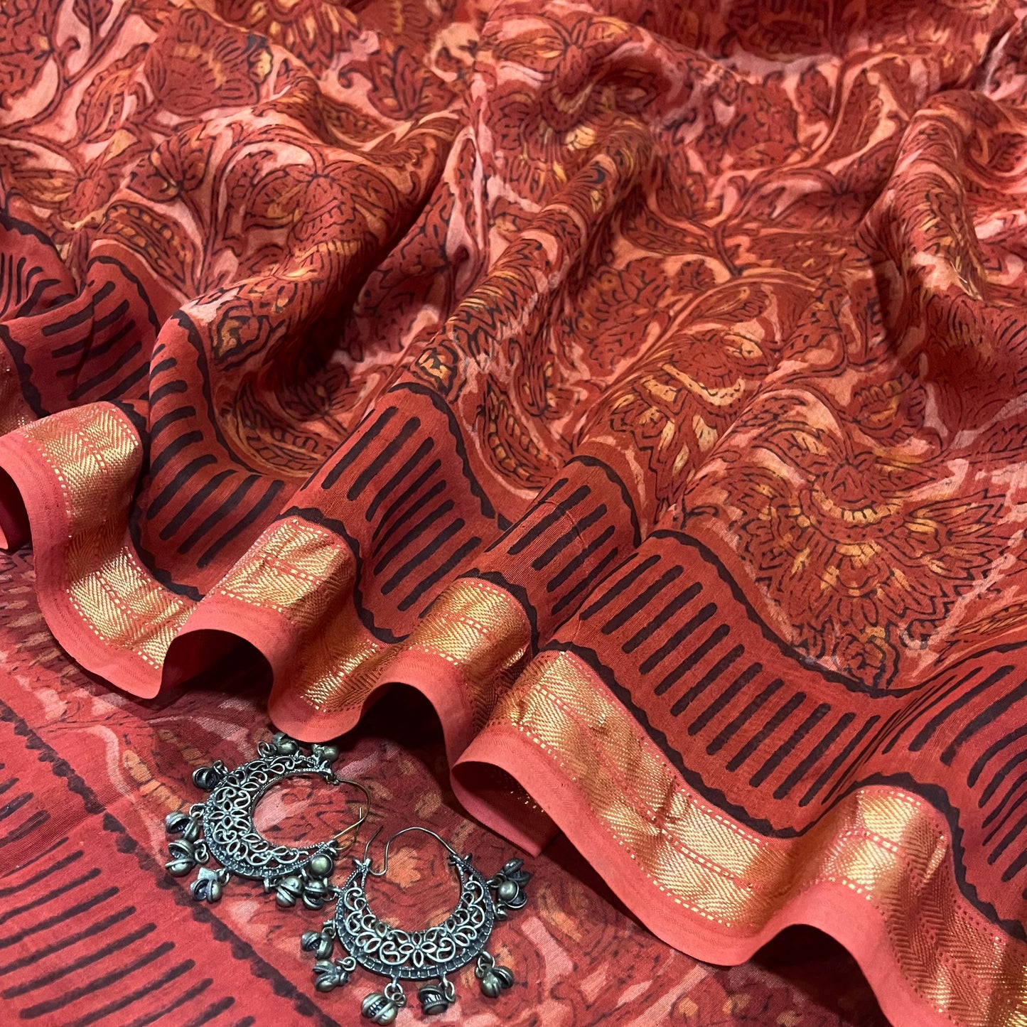 Rust Maheshwari saree with ajrakh print all over