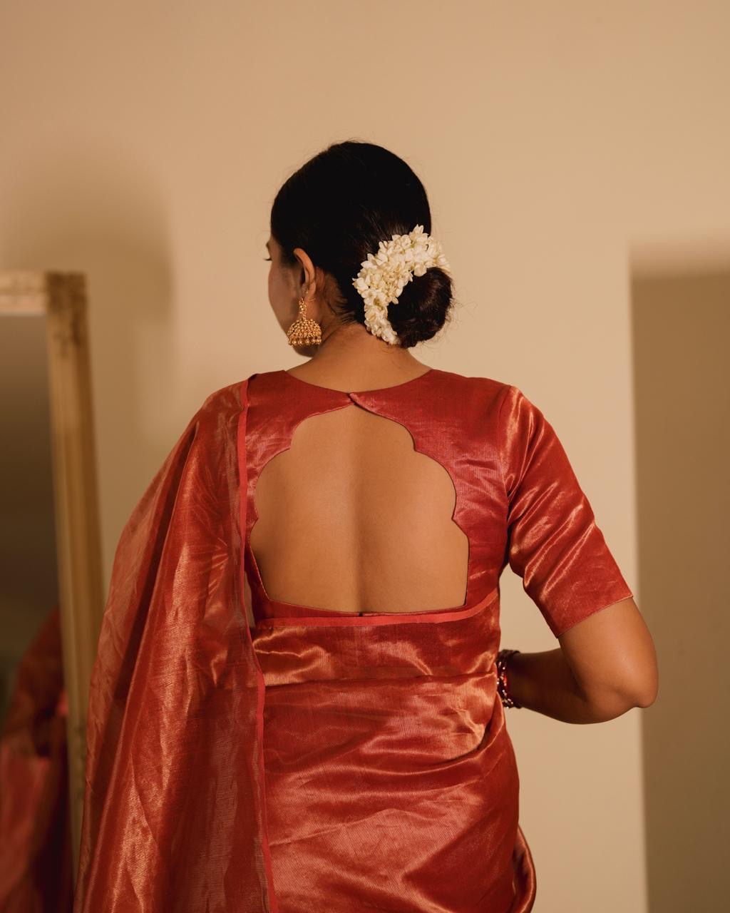 Red Maheshwari saree with zari lines all over