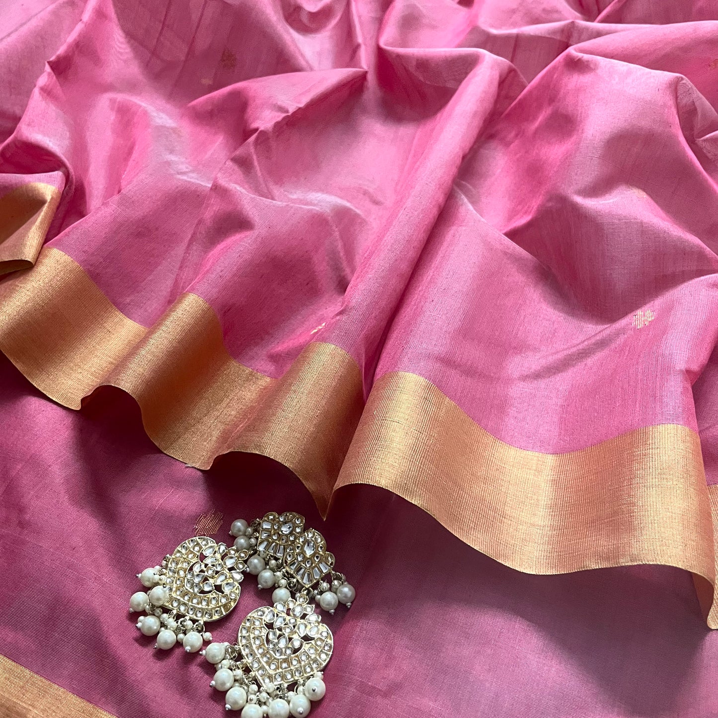 Rose pink Chanderi saree with zari bootis all over and flower motifs on pallu