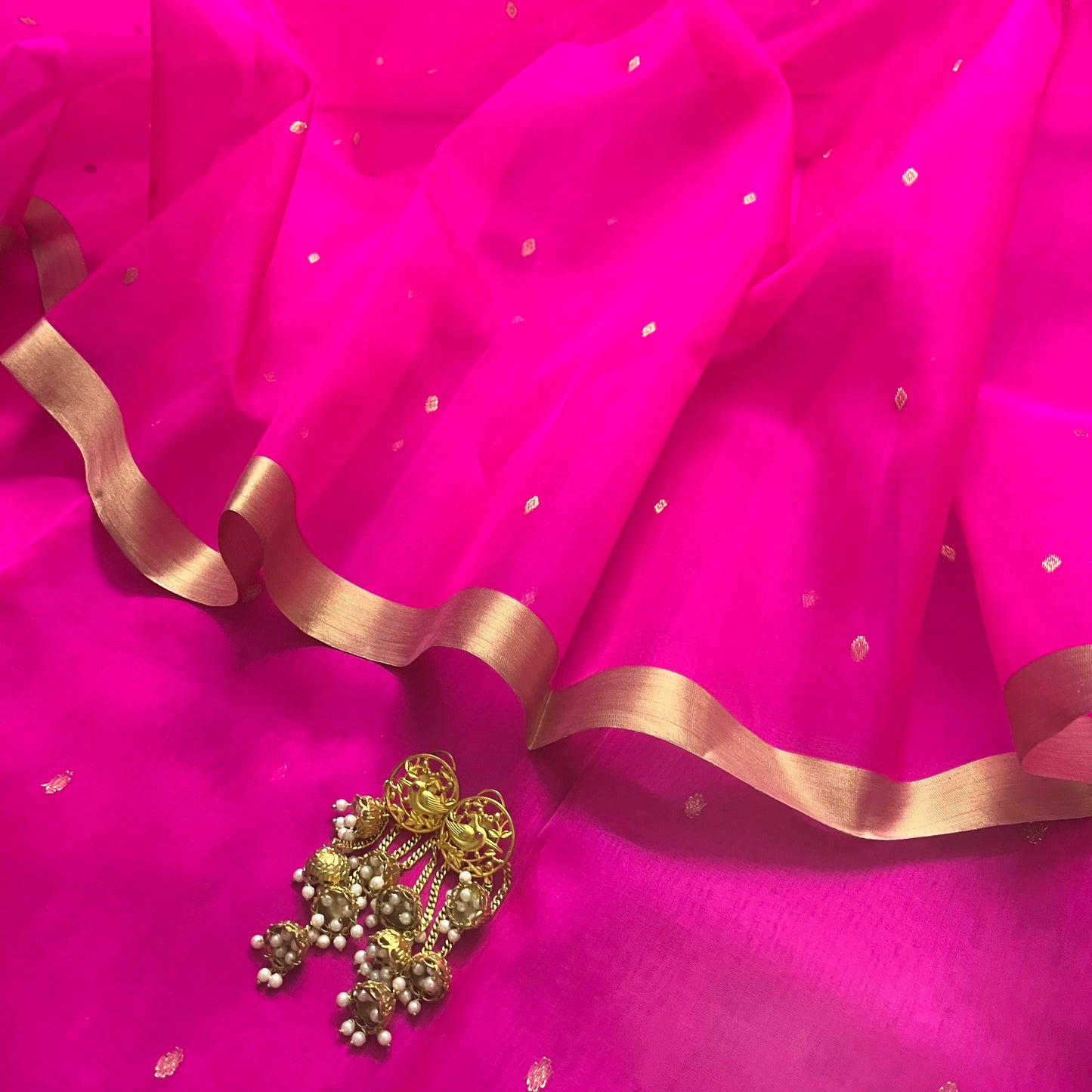 Fuschia pink Chanderi silk saree with zari bootis all over