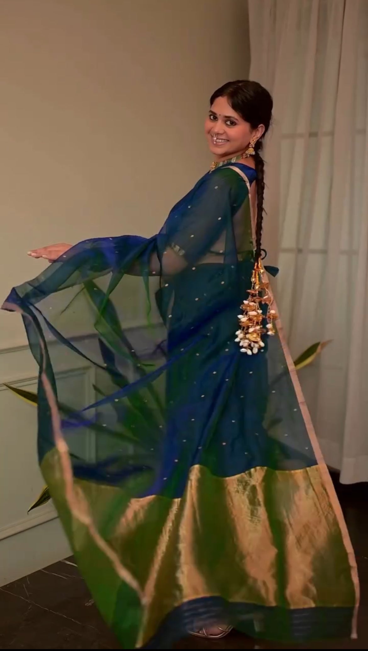 Peacock blue and green dual tone Chanderi organza silk saree with zari bootis all over