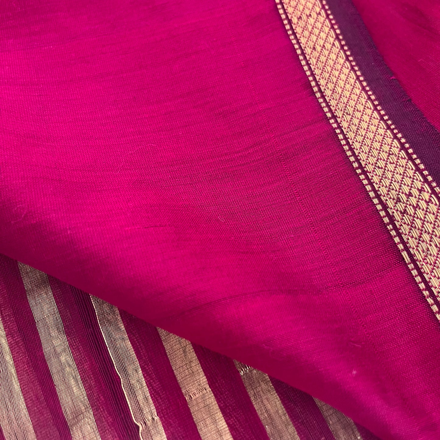 Dark pink Maheshwari saree with zari stripes all over