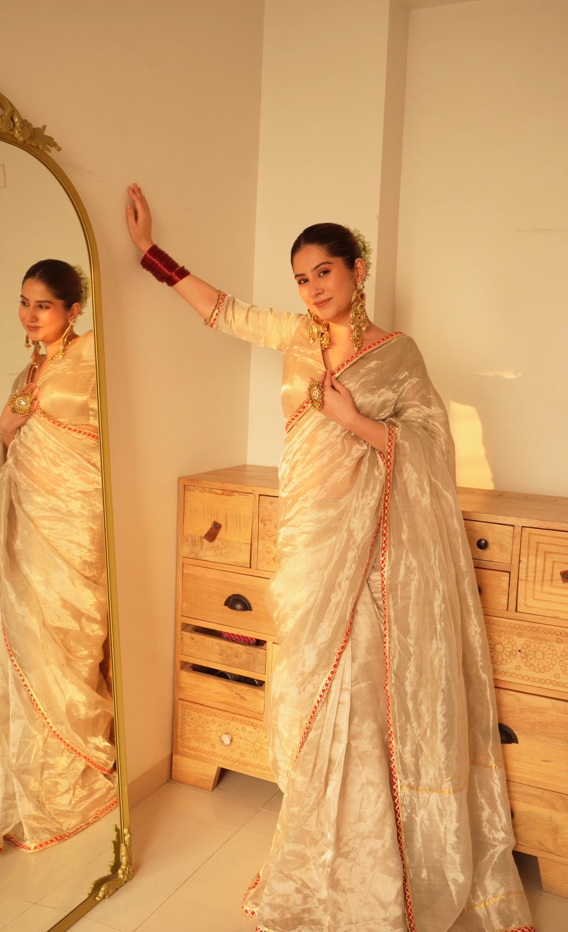 Chantilly cream and red Chanderi tissue silk saree with zari bootis all over