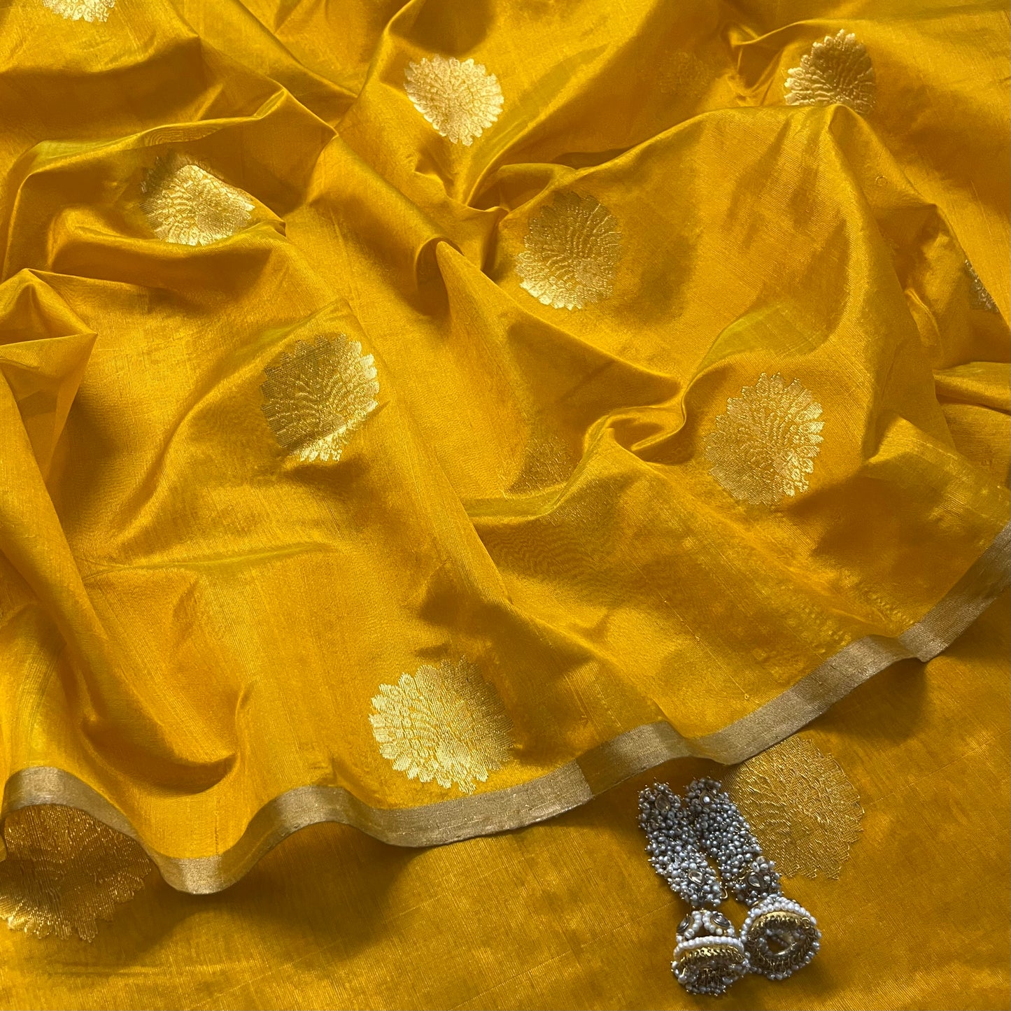 Yellow chanderi silk saree with mor motifs all over