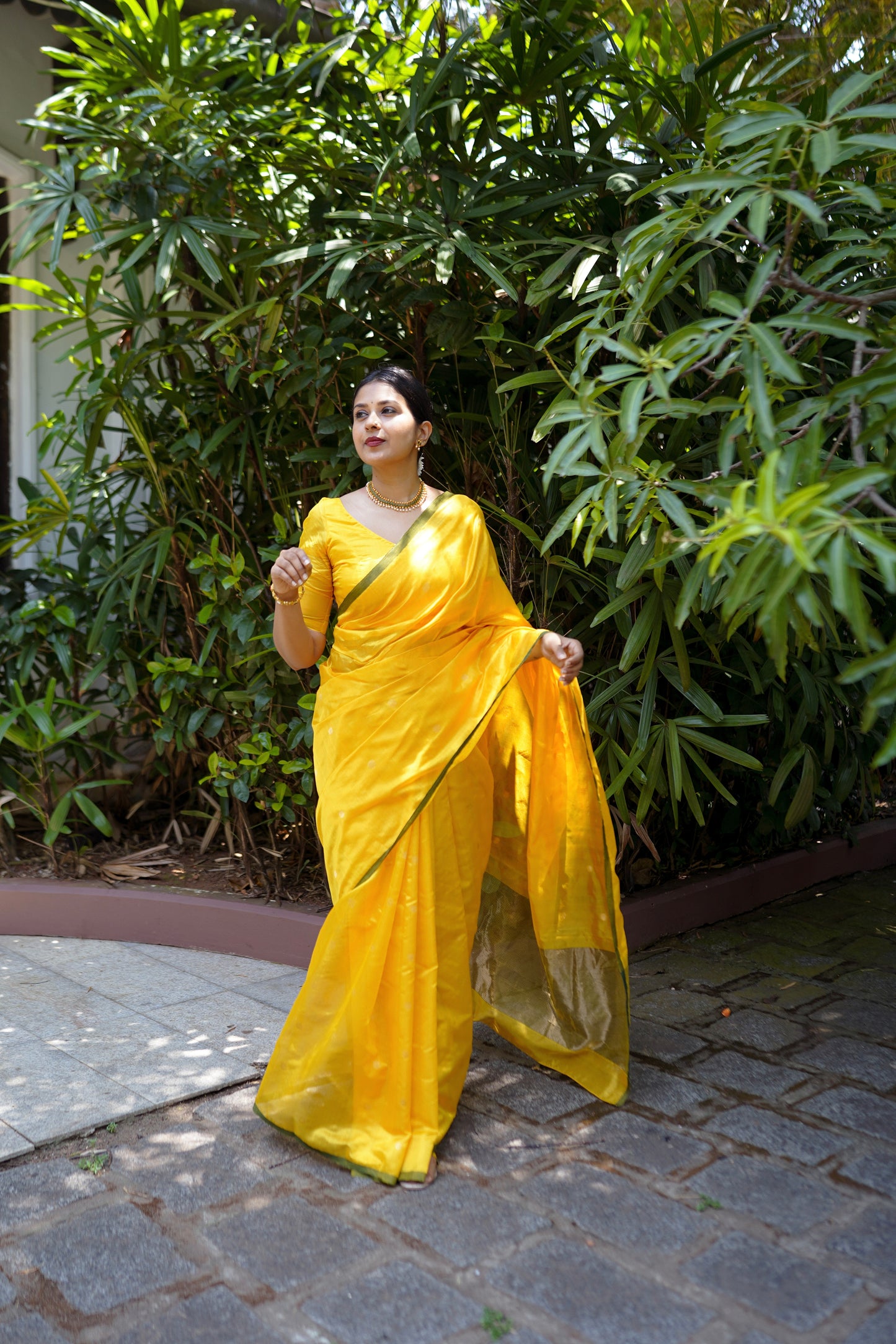 Yellow and green chanderi silk saree with flower bootis all over