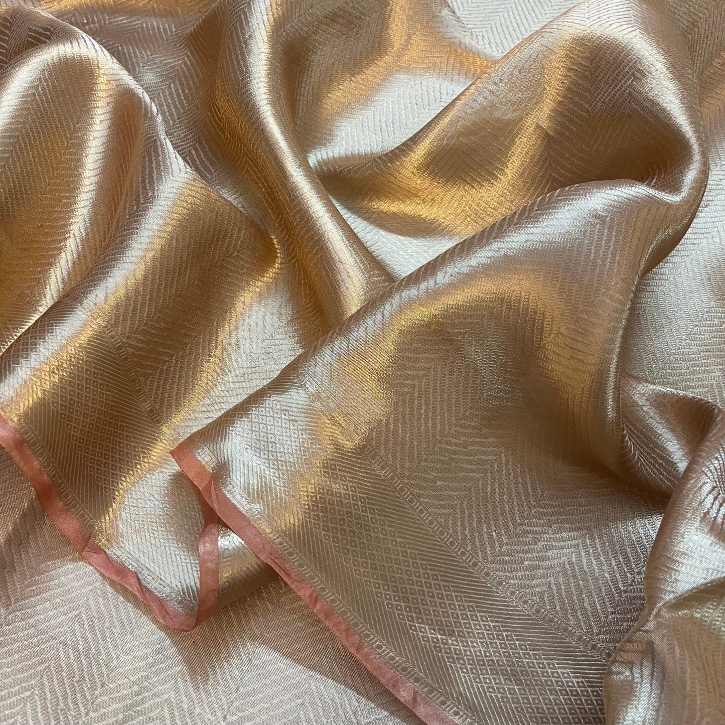 Champagne gold Banarasi silk saree with zari pattern all over