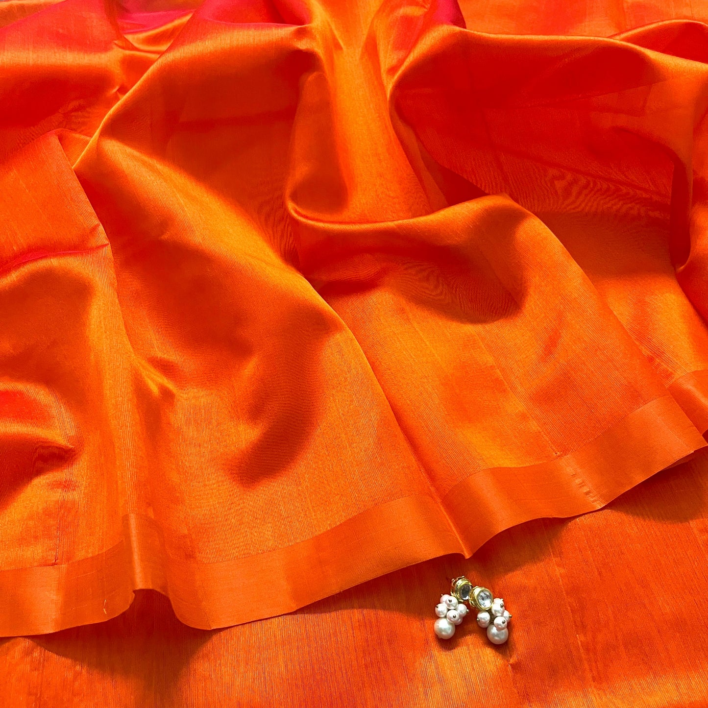 Sunset orange chanderi silk saree with silk border