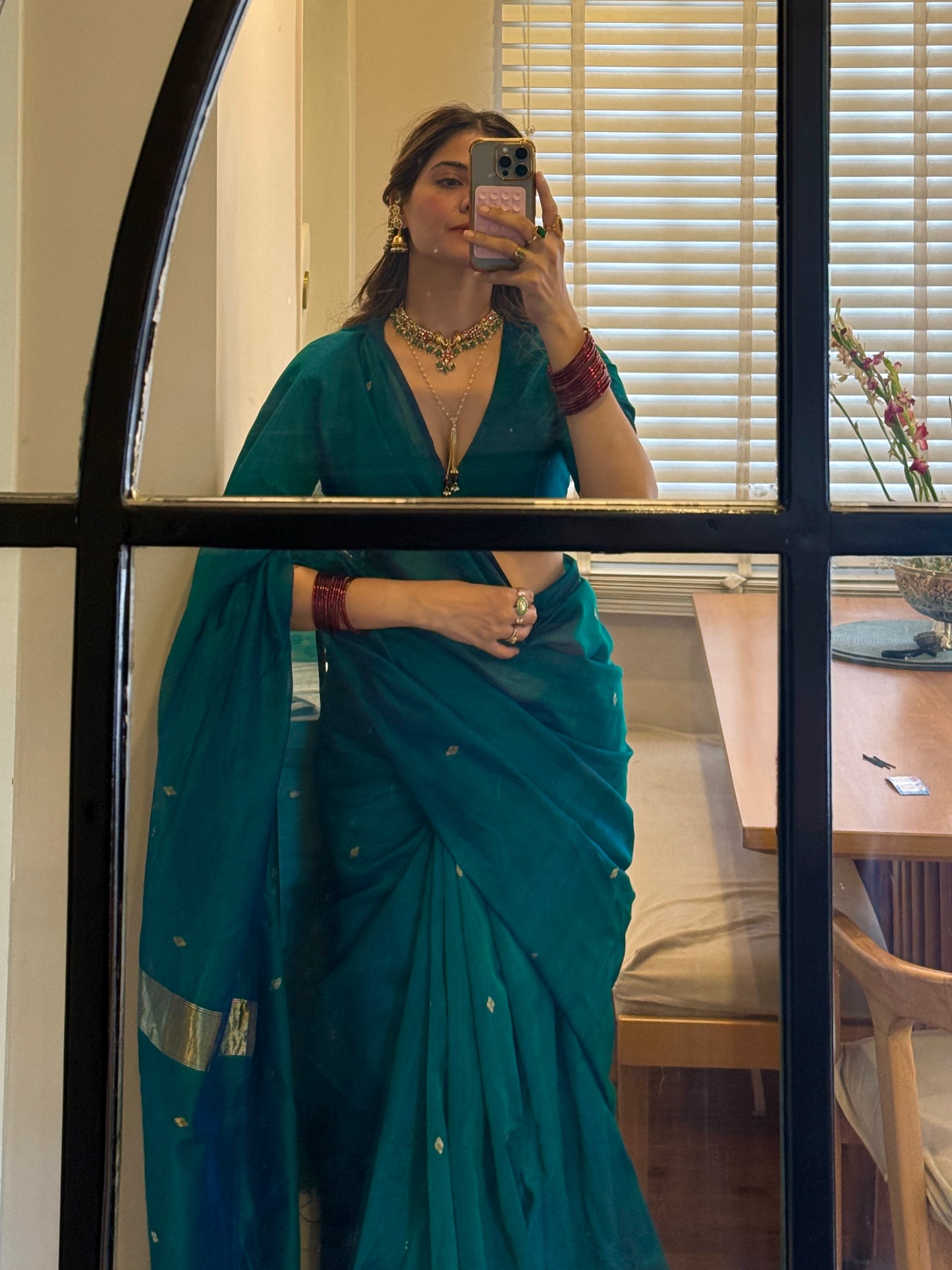 Peacock green and blue dual tone Maheshwari saree with zari bootis all over