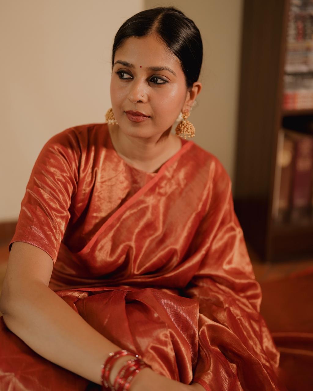 Red Maheshwari saree with zari lines all over