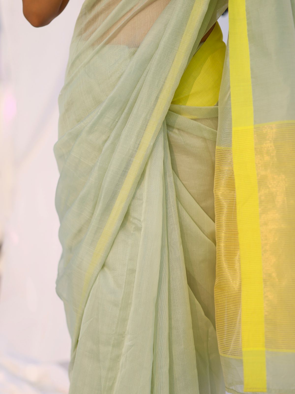Sage and lemon Chanderi saree with zari lines on pallu