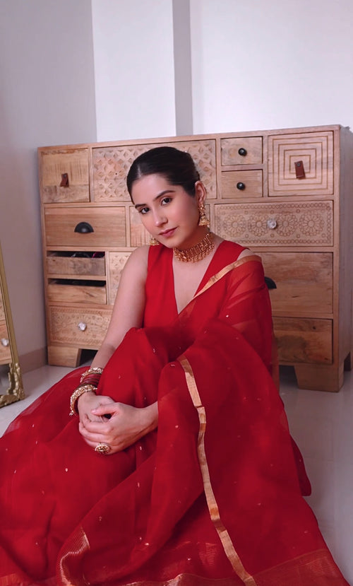 Deep red chanderi organza silk saree with zari bootis all over