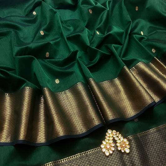 Dark green maheshwari with saree with flower bootis all over