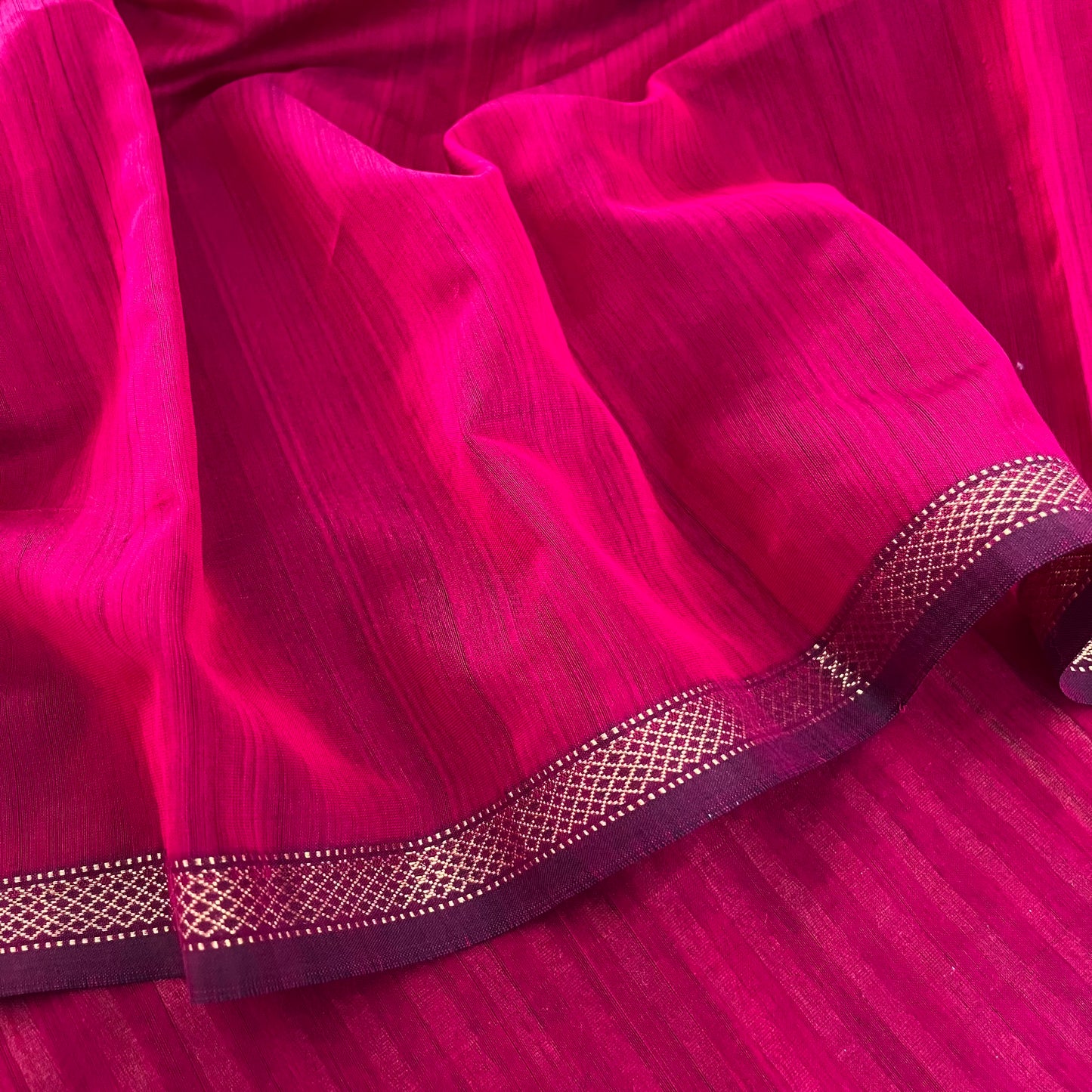 Dark pink Maheshwari saree with zari stripes all over