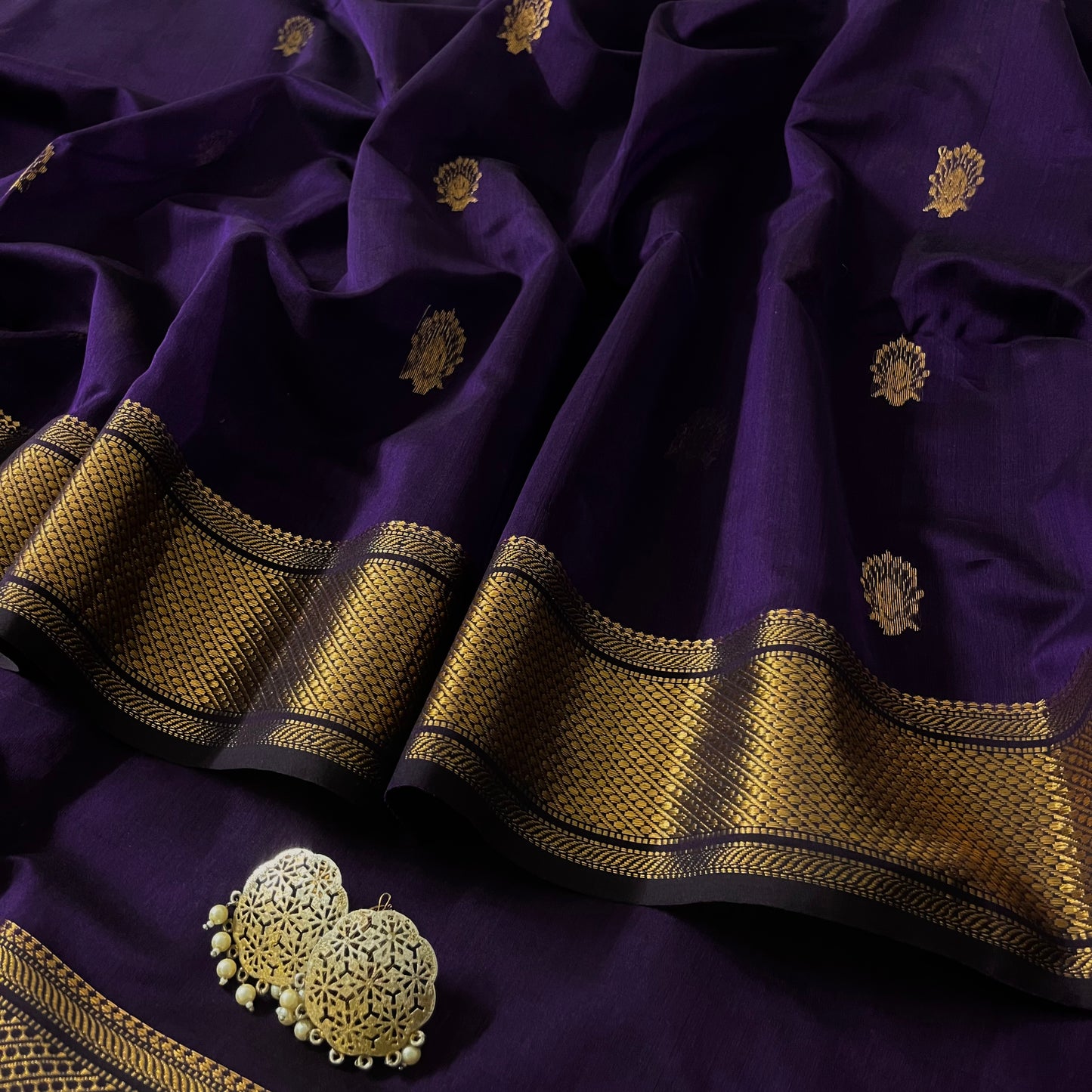 Dark purple Maheshwari saree with zari motifs all over