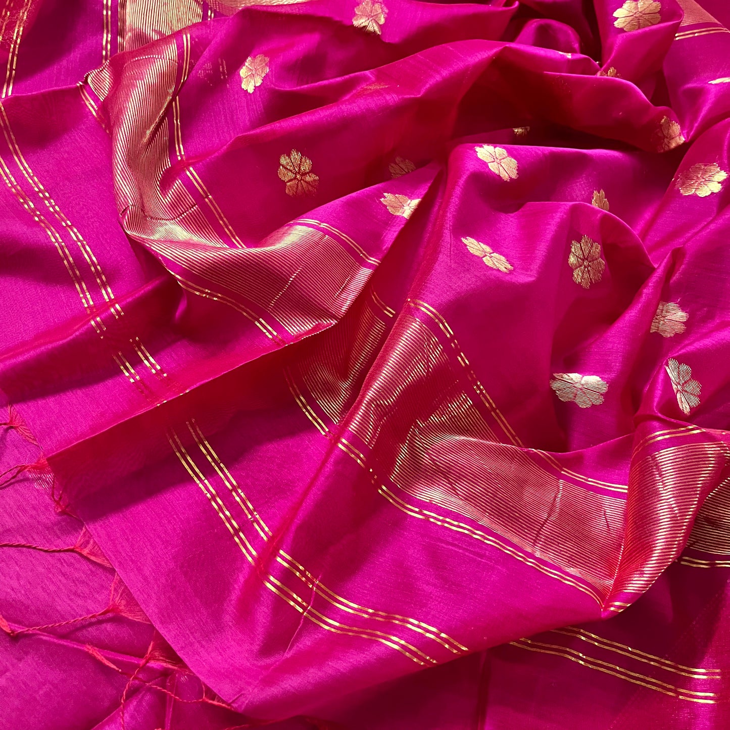 Pink Maheshwari saree with flower bootis all over