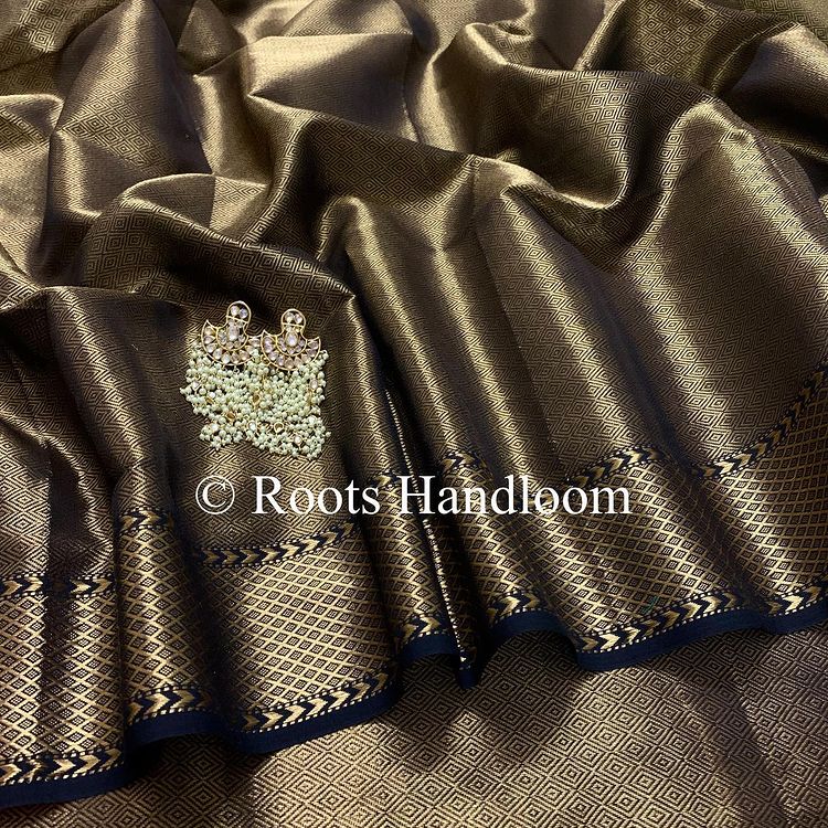 Black and gold Maheshwari with zari pattern all over