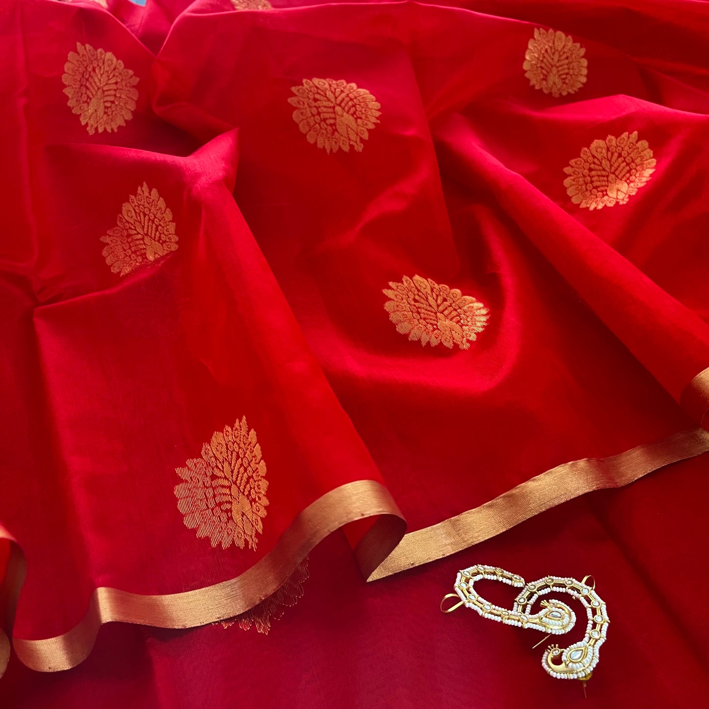 Red Chanderi silk saree with mor motifs all over