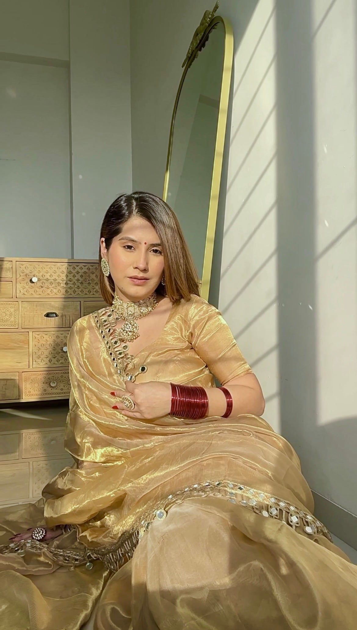 Molten gold chanderi tissue silk saree with dangling mirror work border